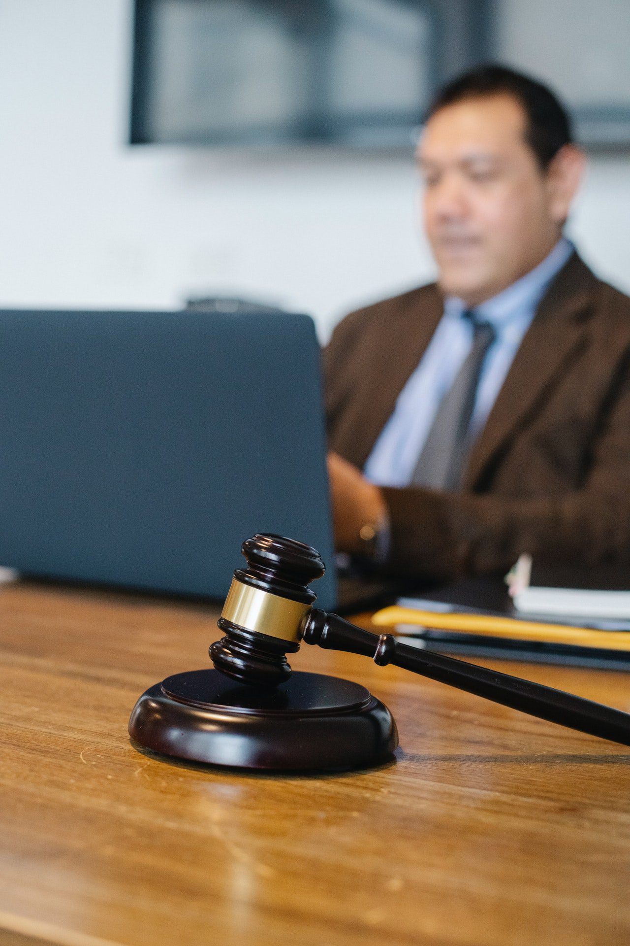pexels-sora-shimazaki-5668791 Male lawyer working on laptop in office